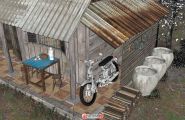 一个乡村木屋+农家器具+摩托车
